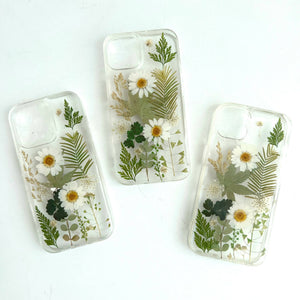 Handmade phone case with green leaves design - image