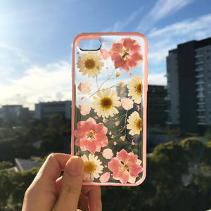 Handmade phone case with pink edged daisy design - image